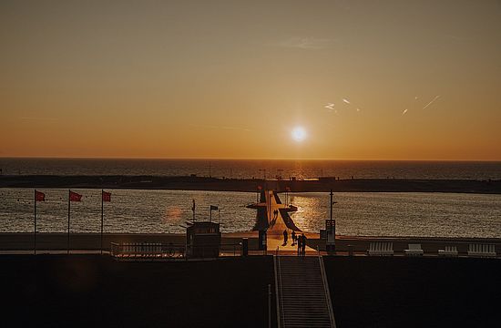 [Translate to EN:] Perlebucht bei Sonnenuntergang